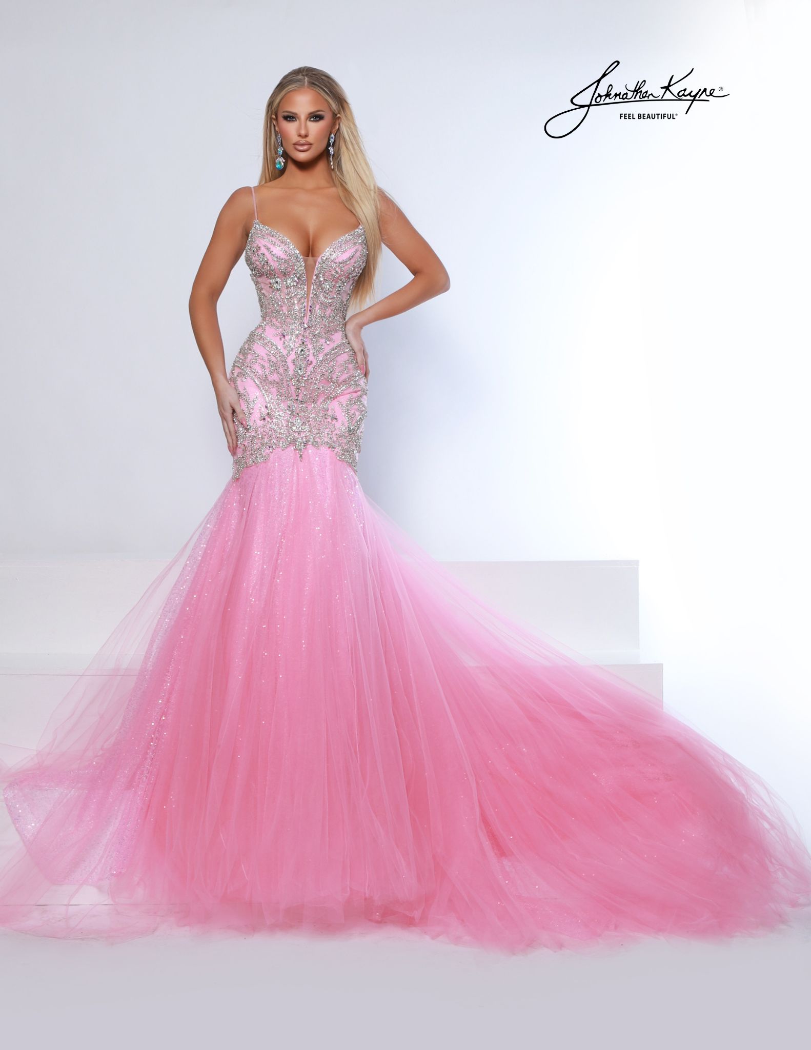 Pink mermaid pageant dress with silver embellishments and flowing mesh train - ideal for pageants, prom, homecoming court, and formal competitions.